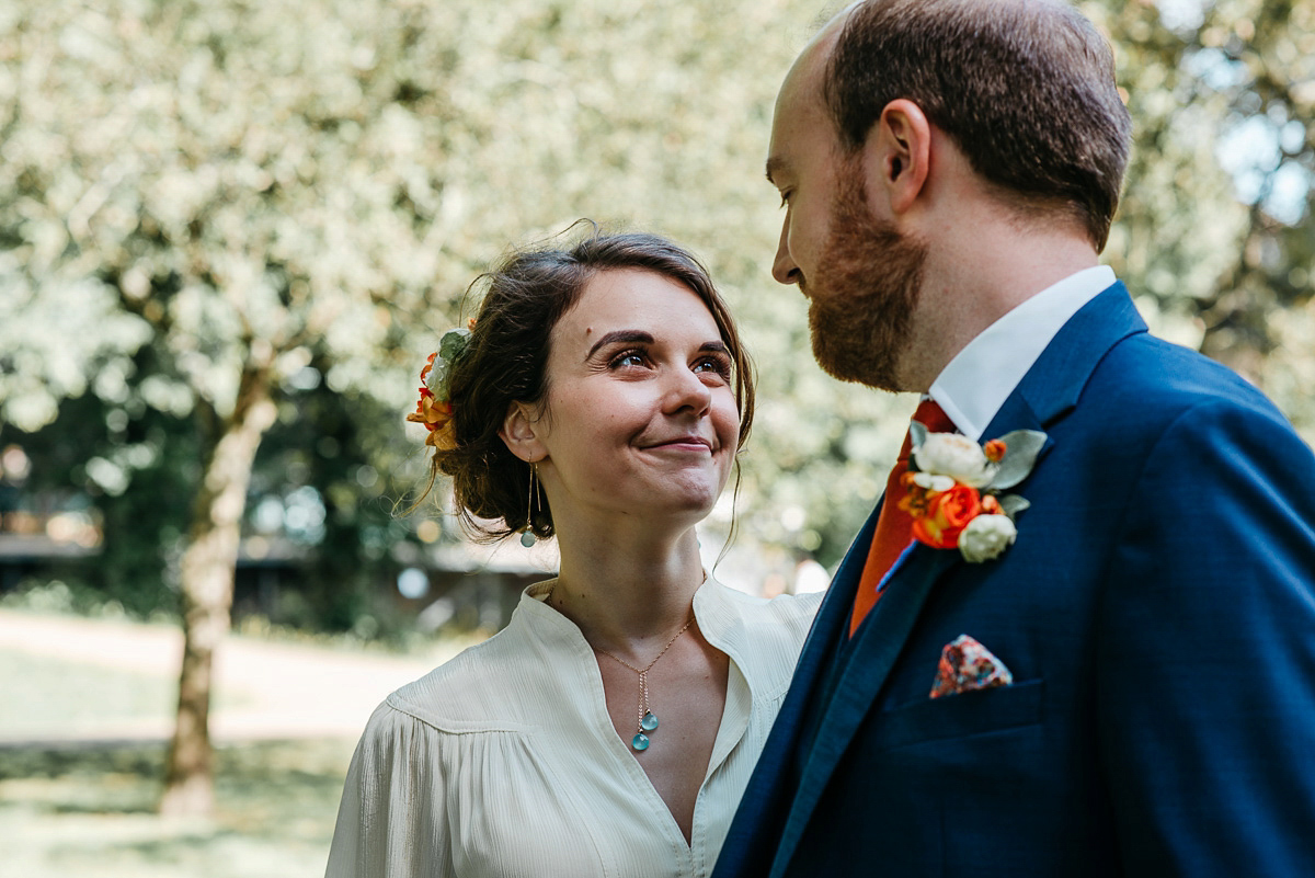 Jo wore the same dress her mother wore - a 1970's Ossie Clarke gown, for her colourful and modern wedding at the Royal Welsh College of Music. Photograhpy by Elaine Williams.