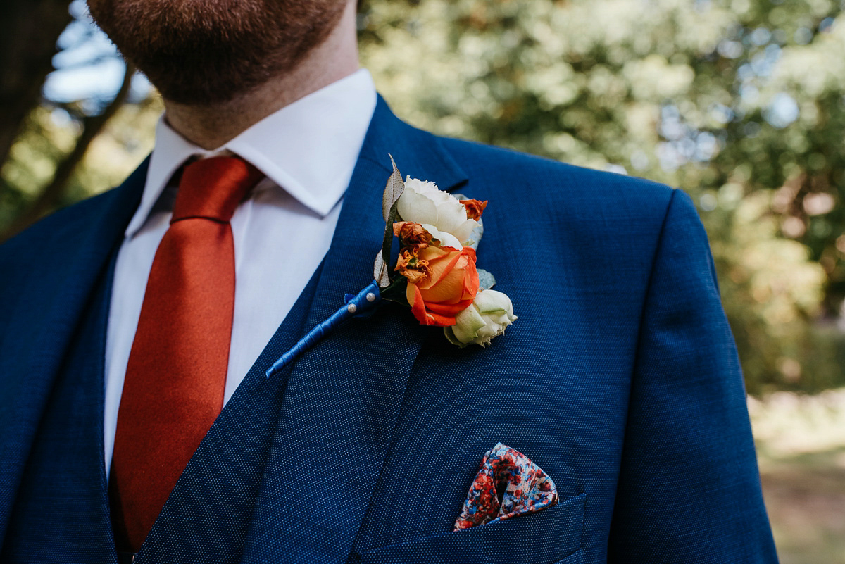 Jo wore the same dress her mother wore - a 1970's Ossie Clarke gown, for her colourful and modern wedding at the Royal Welsh College of Music. Photograhpy by Elaine Williams.