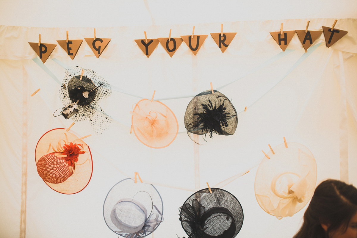 Rosie wore a Laure de Sagazan gown from The Mews of Notting Hill for her romantic summertime Devonshire coast wedding. Photography by Joseph Hall.