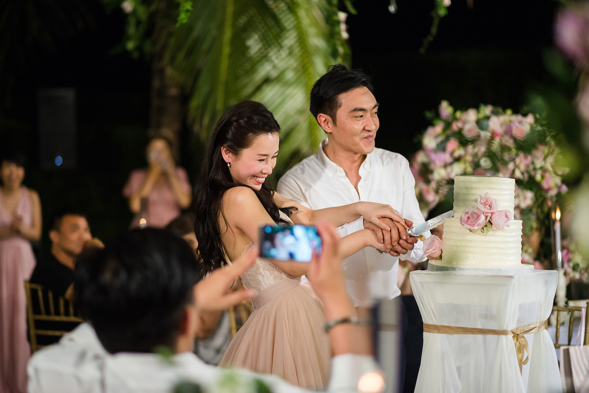 Hong Kiu wore a Jenny Yoo gown and BHLDN tulle skirt for her romantic and elegant wedding in Thailand. The day was planned by 'The Wedding Bliss Thailand'.