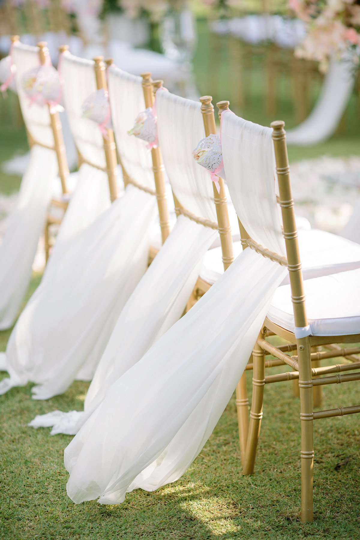 Hong Kiu wore a Jenny Yoo gown and BHLDN tulle skirt for her romantic and elegant wedding in Thailand. The day was planned by 'The Wedding Bliss Thailand'.