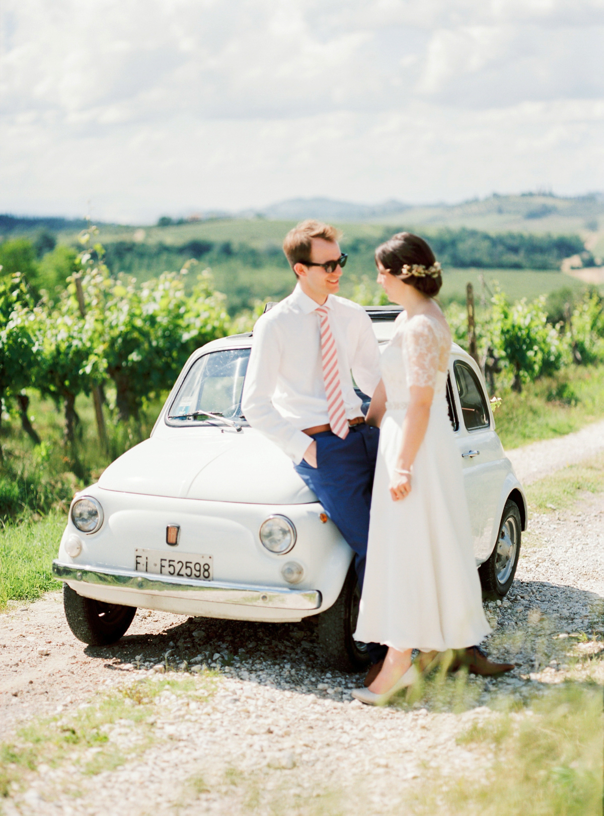 Our Lovettes member and bride Kate wore a 1950's inspired short gown for her wedding in the rural Italian countryside. Photography by Gert Huygaerts.