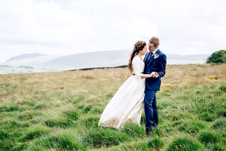 Hannah wore a Regency period inspired dress she made herself for her homemade village hall wedding. Photography by Ash James.