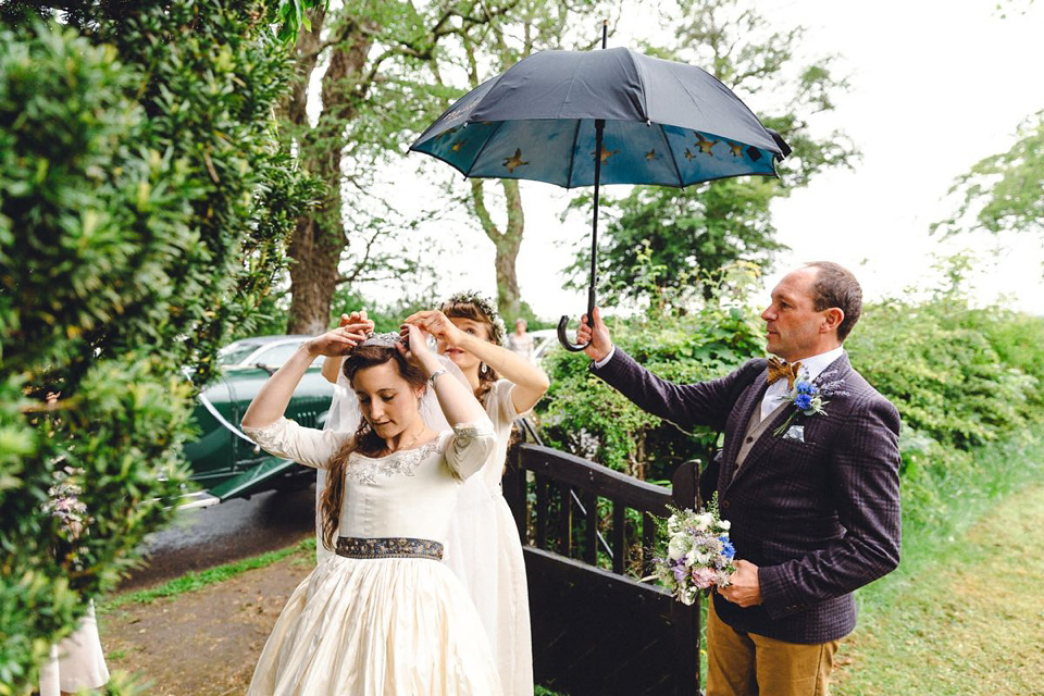 Hannah wore a Regency period inspired dress she made herself for her homemade village hall wedding. Photography by Ash James.