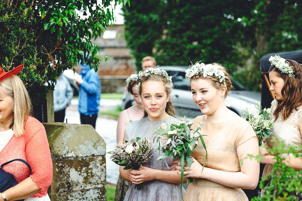 Hannah wore a Regency period inspired dress she made herself for her homemade village hall wedding. Photography by Ash James.