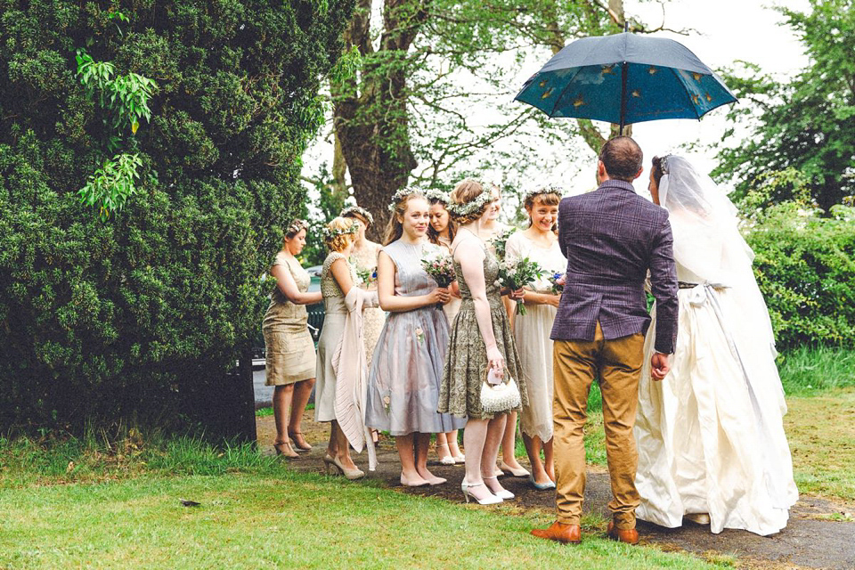 Hannah wore a Regency period inspired dress she made herself for her homemade village hall wedding. Photography by Ash James.