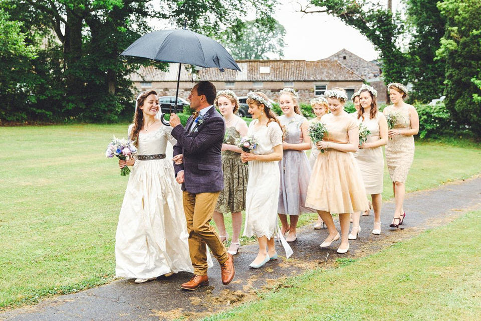 Hannah wore a Regency period inspired dress she made herself for her homemade village hall wedding. Photography by Ash James.