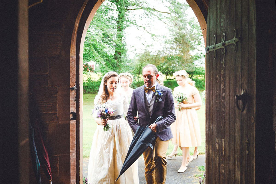Hannah wore a Regency period inspired dress she made herself for her homemade village hall wedding. Photography by Ash James.