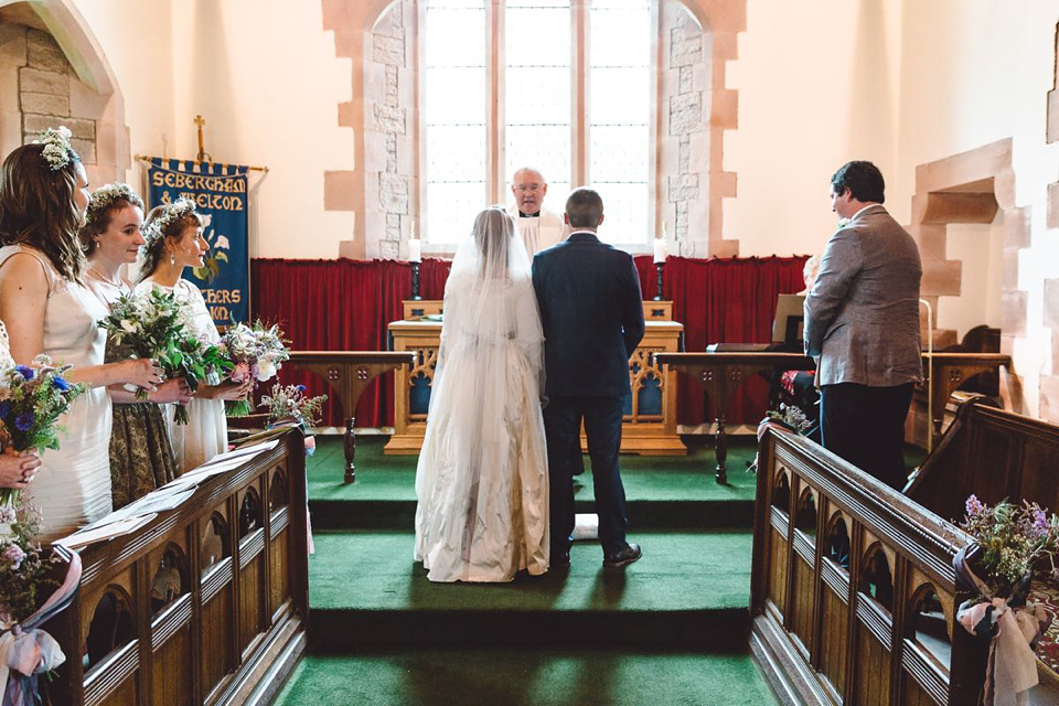 Hannah wore a Regency period inspired dress she made herself for her homemade village hall wedding. Photography by Ash James.