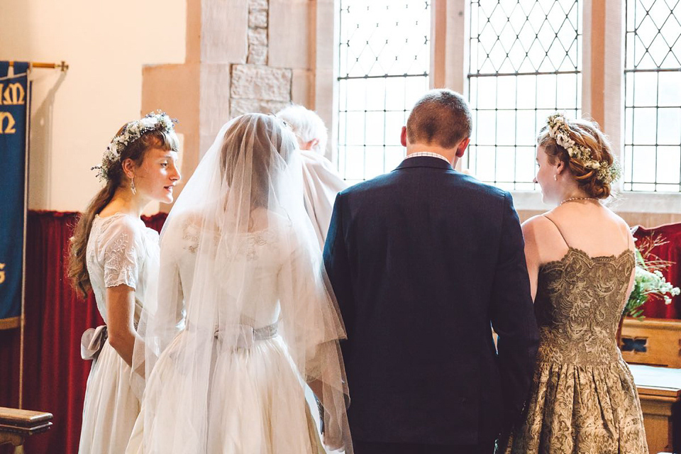 Hannah wore a Regency period inspired dress she made herself for her homemade village hall wedding. Photography by Ash James.