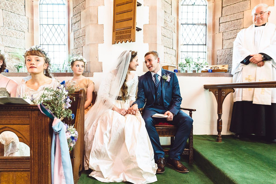 Hannah wore a Regency period inspired dress she made herself for her homemade village hall wedding. Photography by Ash James.