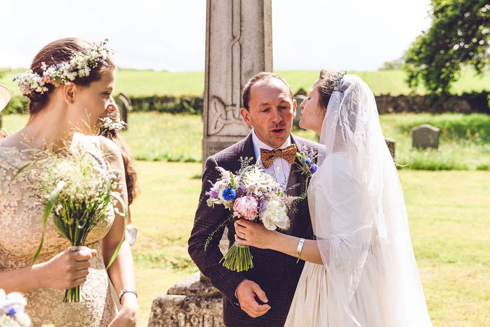 Hannah wore a Regency period inspired dress she made herself for her homemade village hall wedding. Photography by Ash James.