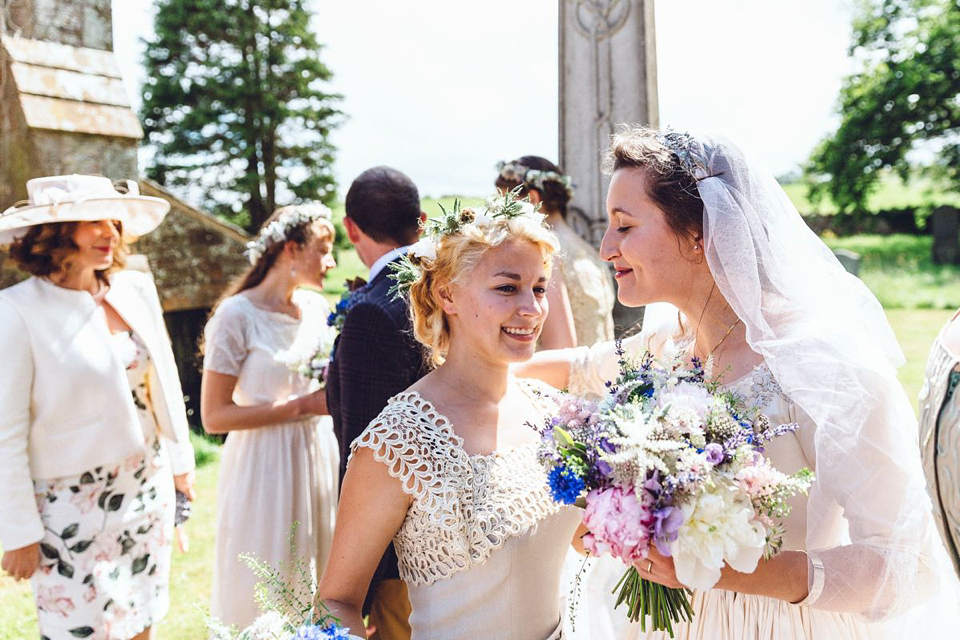 Hannah wore a Regency period inspired dress she made herself for her homemade village hall wedding. Photography by Ash James.