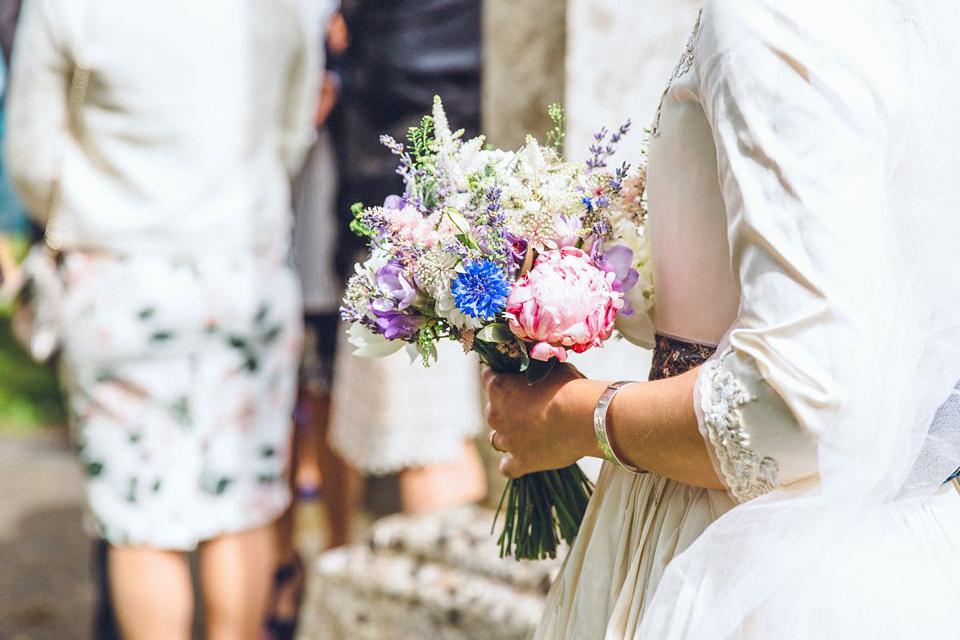 Hannah wore a Regency period inspired dress she made herself for her homemade village hall wedding. Photography by Ash James.