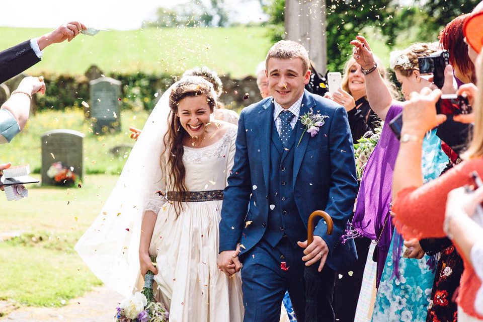 Hannah wore a Regency period inspired dress she made herself for her homemade village hall wedding. Photography by Ash James.