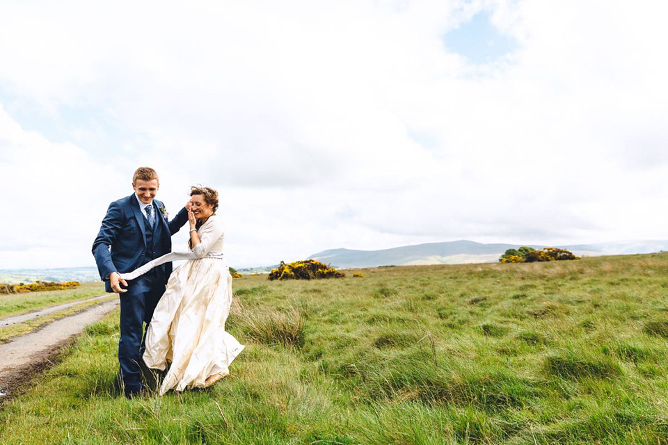 Hannah wore a Regency period inspired dress she made herself for her homemade village hall wedding. Photography by Ash James.