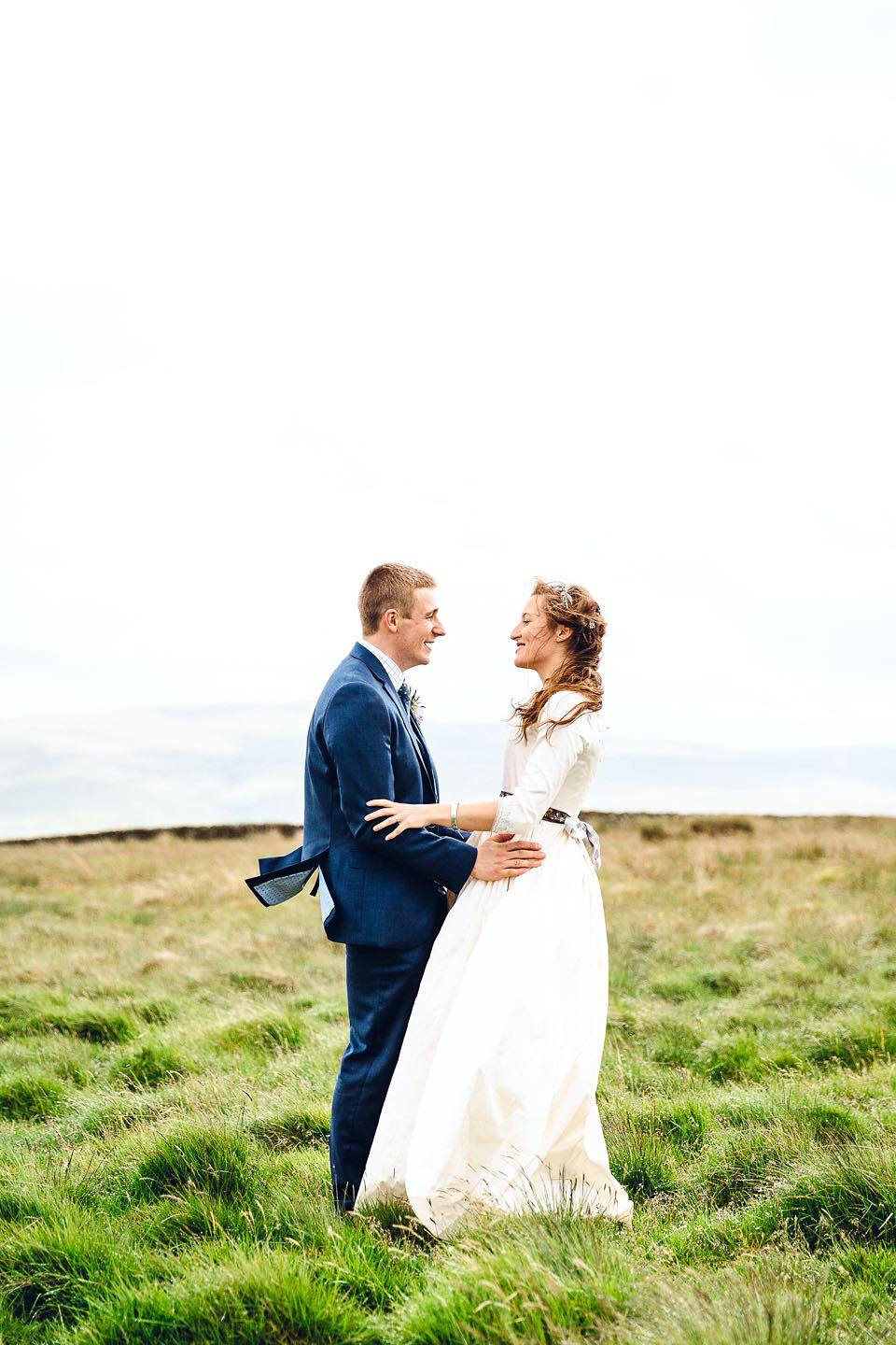 Hannah wore a Regency period inspired dress she made herself for her homemade village hall wedding. Photography by Ash James.