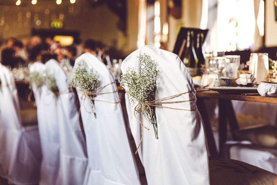 Hannah wore a Regency period inspired dress she made herself for her homemade village hall wedding. Photography by Ash James.