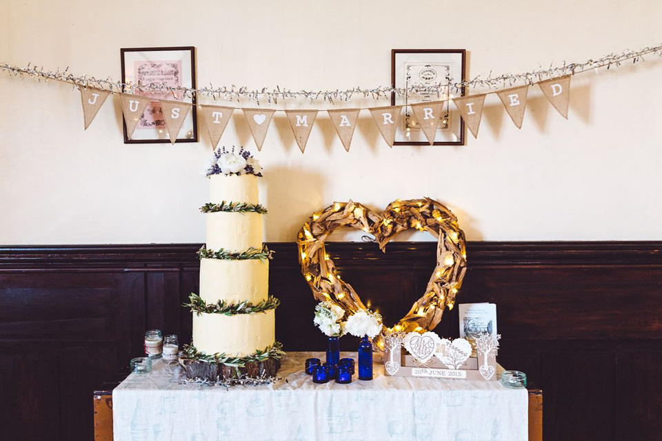 Hannah wore a Regency period inspired dress she made herself for her homemade village hall wedding. Photography by Ash James.