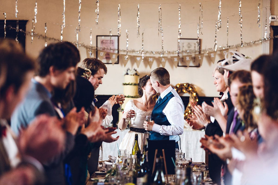 Hannah wore a Regency period inspired dress she made herself for her homemade village hall wedding. Photography by Ash James.