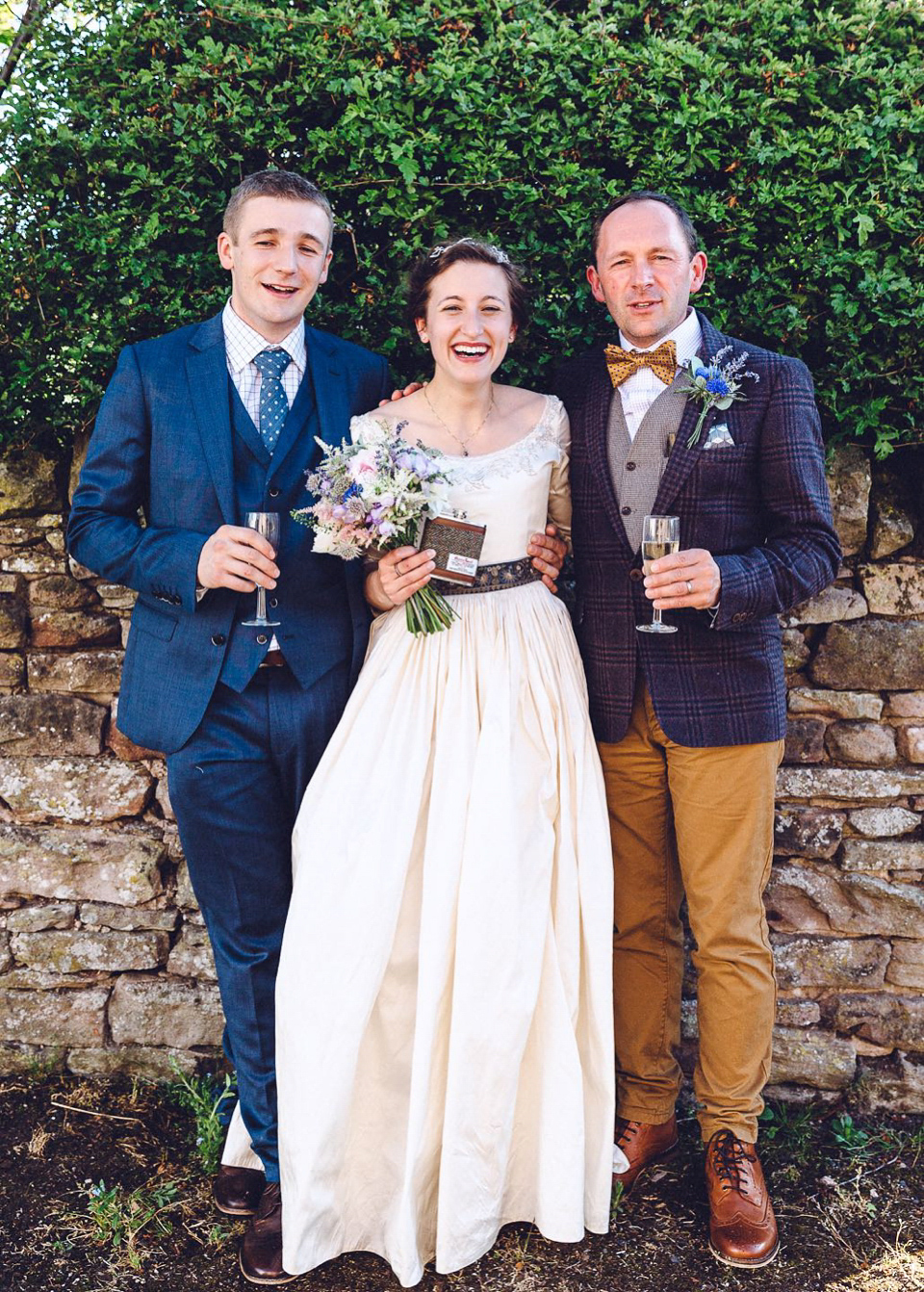 Hannah wore a Regency period inspired dress she made herself for her homemade village hall wedding. Photography by Ash James.