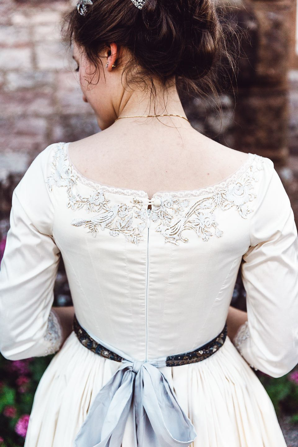 Hannah wore a Regency period inspired dress she made herself for her homemade village hall wedding. Photography by Ash James.