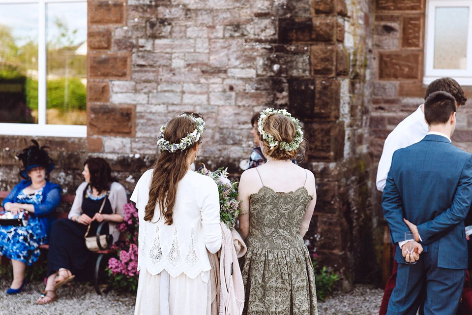 Hannah wore a Regency period inspired dress she made herself for her homemade village hall wedding. Photography by Ash James.