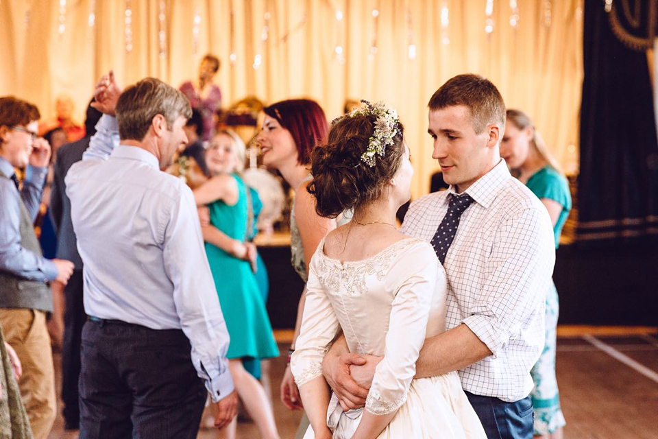 Hannah wore a Regency period inspired dress she made herself for her homemade village hall wedding. Photography by Ash James.