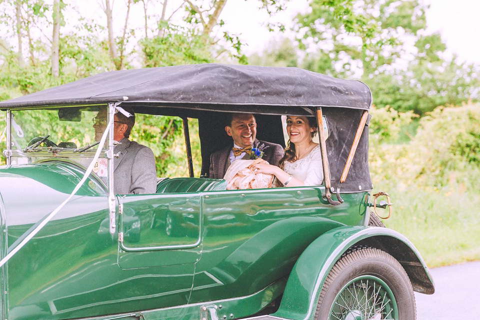 Hannah wore a Regency period inspired dress she made herself for her homemade village hall wedding. Photography by Ash James.