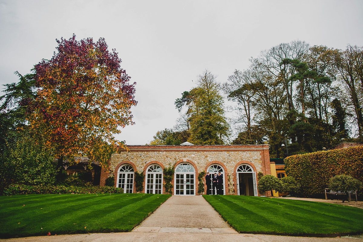Charlie wore an Annsul Y gown and Rosie Willett headpiece for her Elegant Autumn wedding at the Orangery in Kent. Photography by Jonny MP.