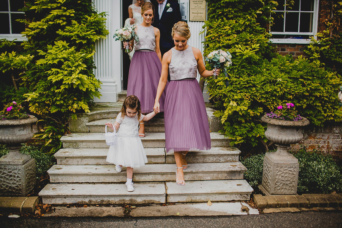 Charlie wore an Annsul Y gown and Rosie Willett headpiece for her Elegant Autumn wedding at the Orangery in Kent. Photography by Jonny MP.