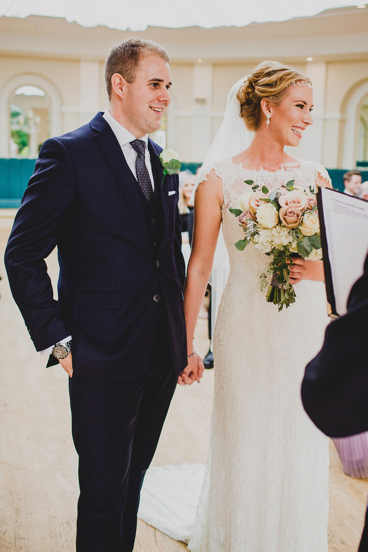 Charlie wore an Annsul Y gown and Rosie Willett headpiece for her Elegant Autumn wedding at the Orangery in Kent. Photography by Jonny MP.