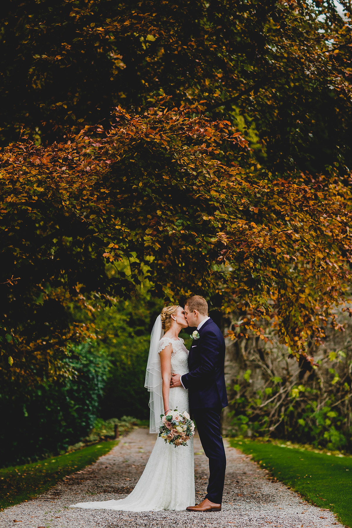 Charlie wore an Annsul Y gown and Rosie Willett headpiece for her Elegant Autumn wedding at the Orangery in Kent. Photography by Jonny MP.