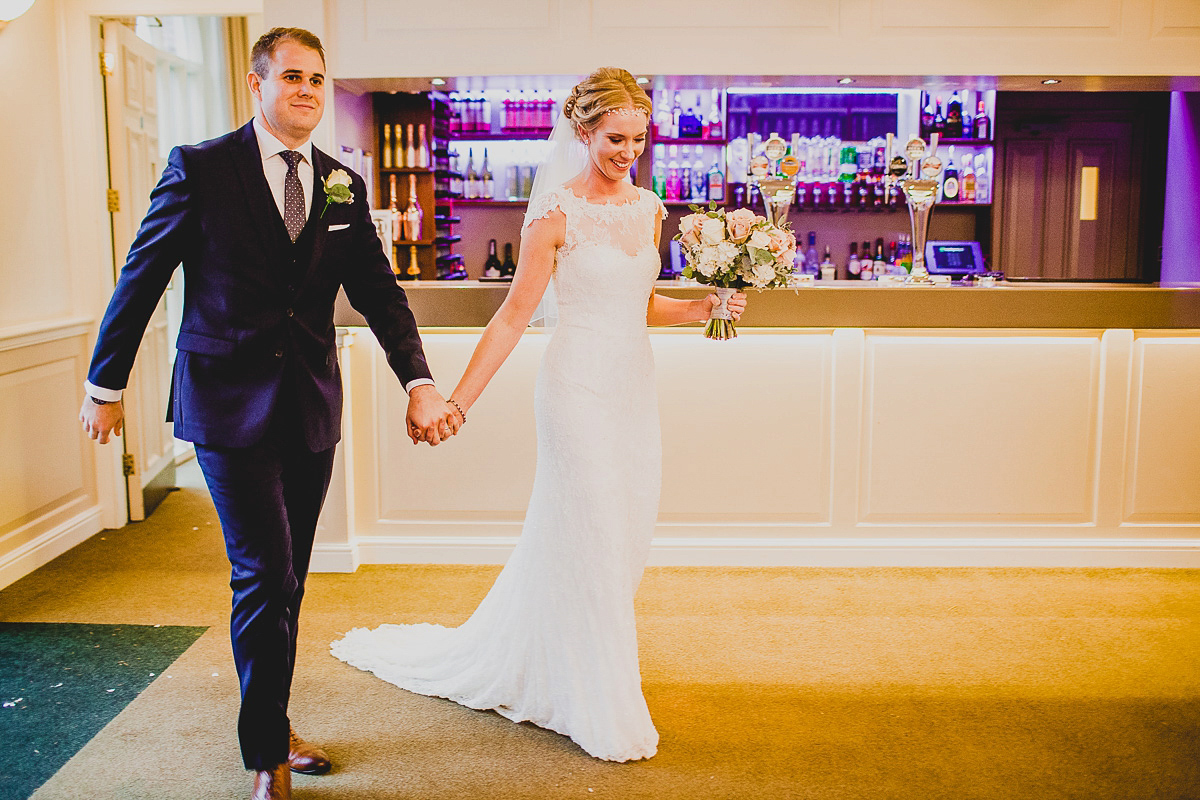 Charlie wore an Annsul Y gown and Rosie Willett headpiece for her Elegant Autumn wedding at the Orangery in Kent. Photography by Jonny MP.