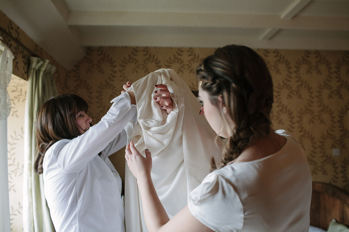 Rachel wore the Payton slip and Sabine top by Charlie Brear for her romantic, 1930's inspired winter wedding in Somerset. Photography by Joanna Brown.