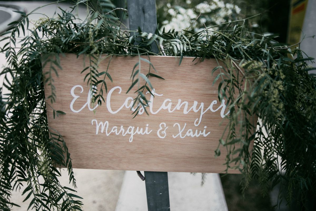 Bride Margarita wore a backless dress for her rustic woodland wedding in Spain. Photography by Sarah Lobla.