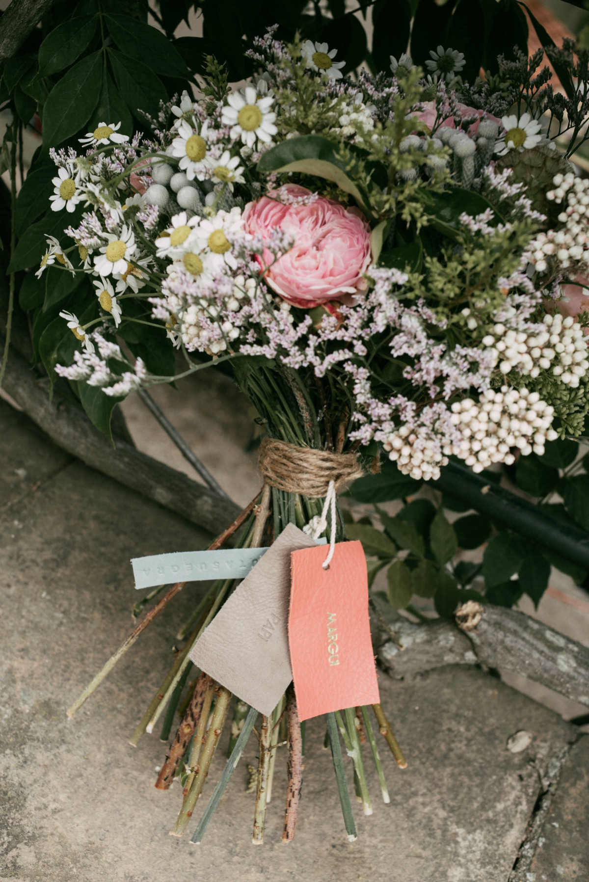 Bride Margarita wore a backless dress for her rustic woodland wedding in Spain. Photography by Sarah Lobla.