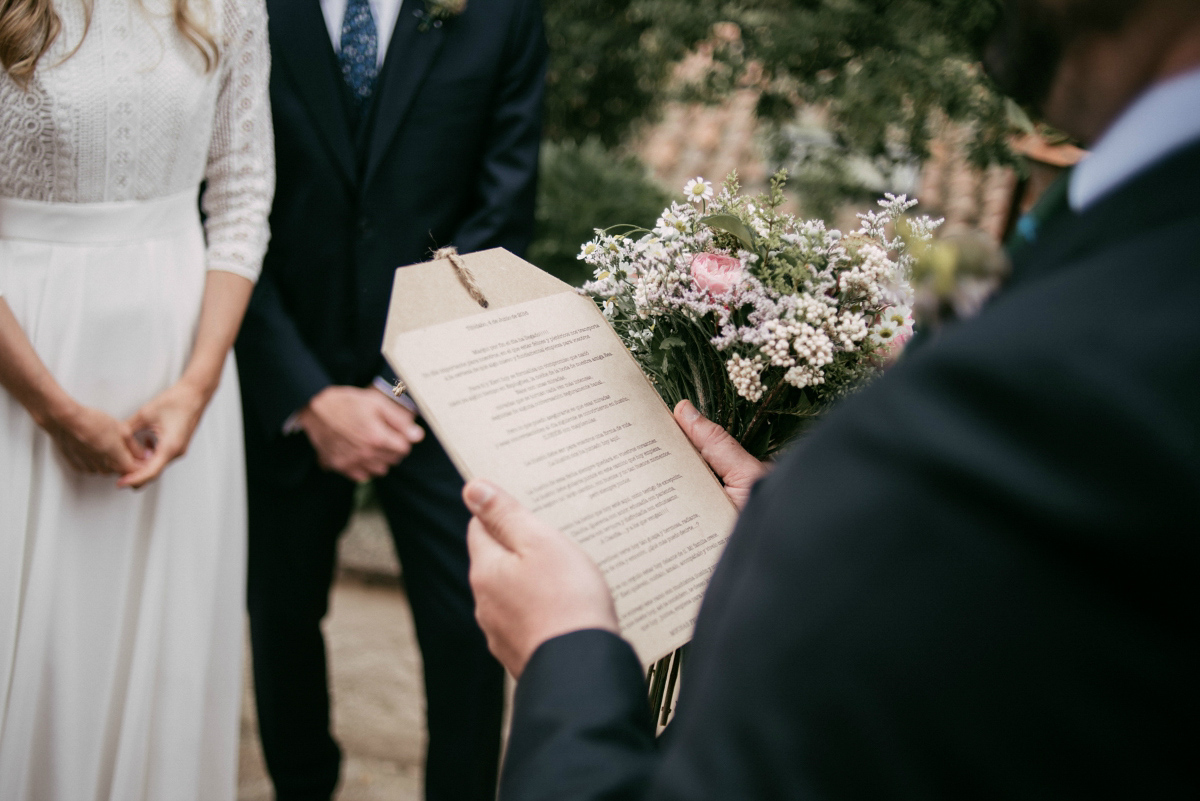 Bride Margarita wore a backless dress for her rustic woodland wedding in Spain. Photography by Sarah Lobla.