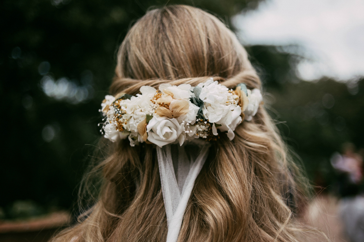 Bride Margarita wore a backless dress for her rustic woodland wedding in Spain. Photography by Sarah Lobla.