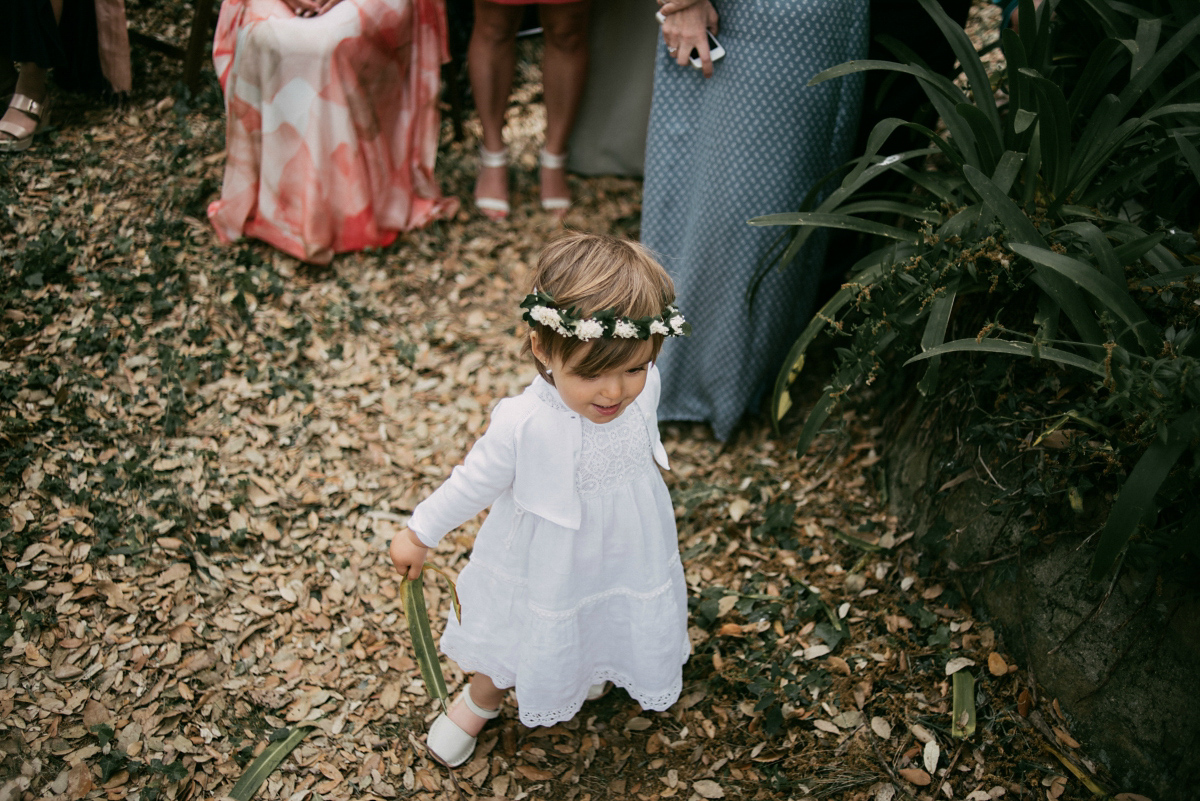 Bride Margarita wore a backless dress for her rustic woodland wedding in Spain. Photography by Sarah Lobla.