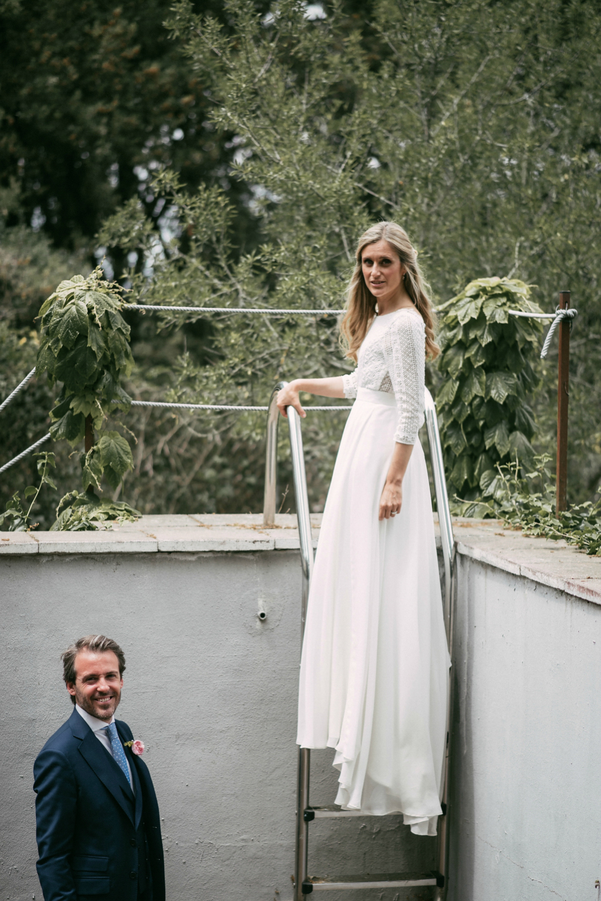 Bride Margarita wore a backless dress for her rustic woodland wedding in Spain. Photography by Sarah Lobla.