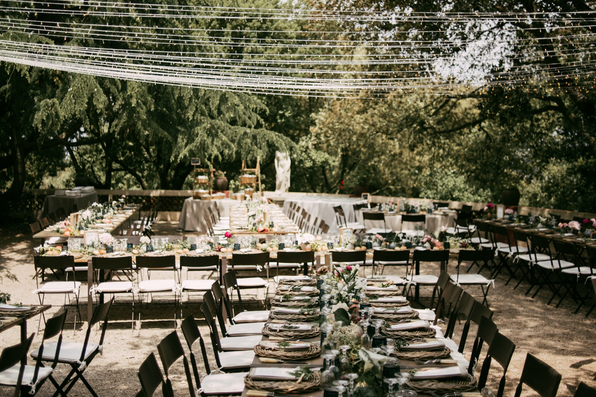 Bride Margarita wore a backless dress for her rustic woodland wedding in Spain. Photography by Sarah Lobla.