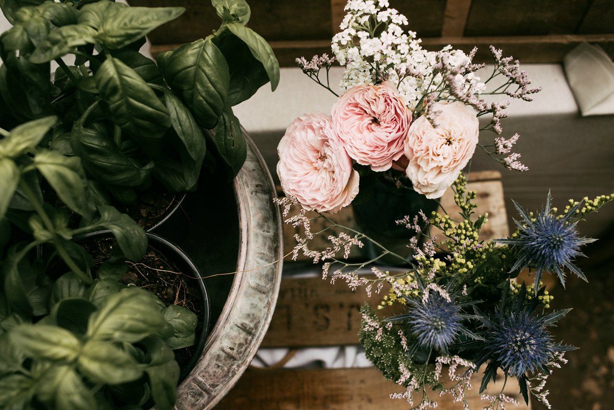 Bride Margarita wore a backless dress for her rustic woodland wedding in Spain. Photography by Sarah Lobla.