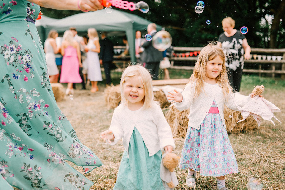 A festival inspired farm wedding in shades of peach. Photography by Rosie Hardy and Adam Bird.