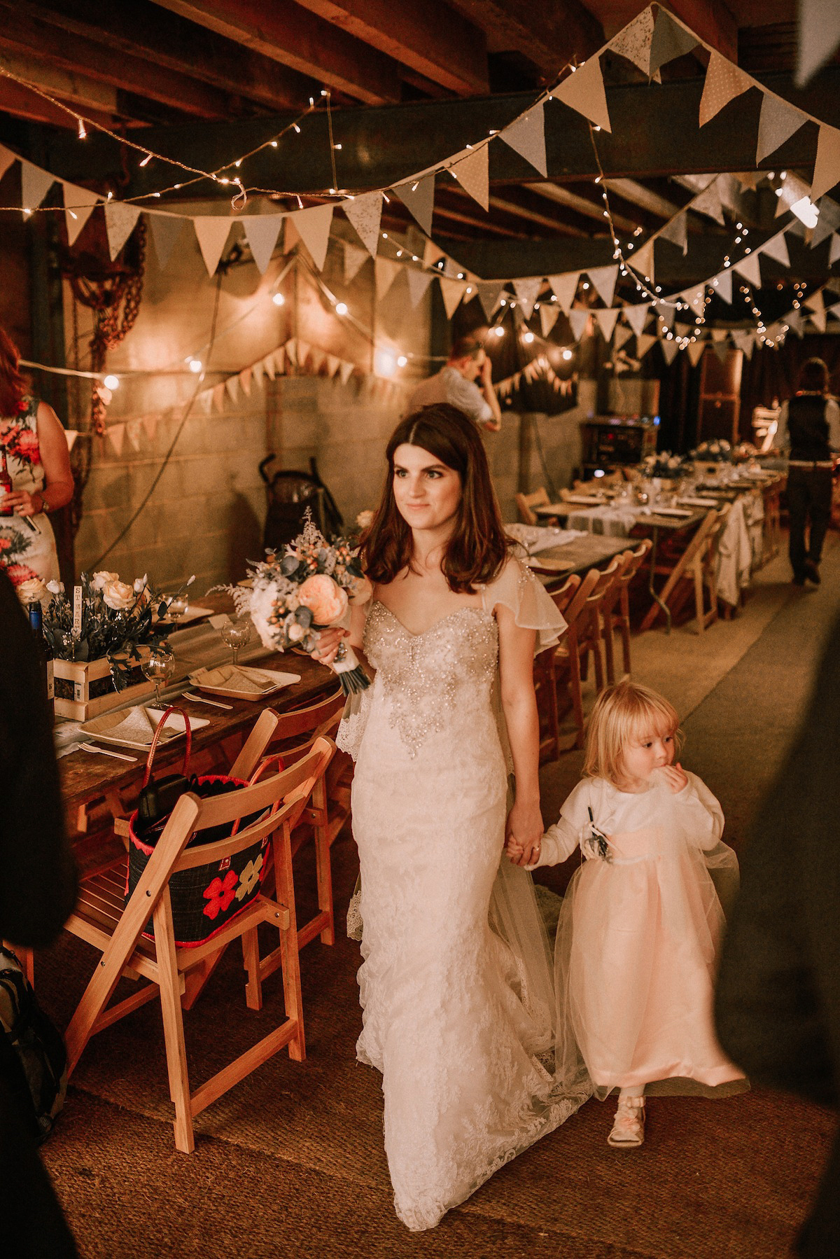 A festival inspired farm wedding in shades of peach. Photography by Rosie Hardy and Adam Bird.