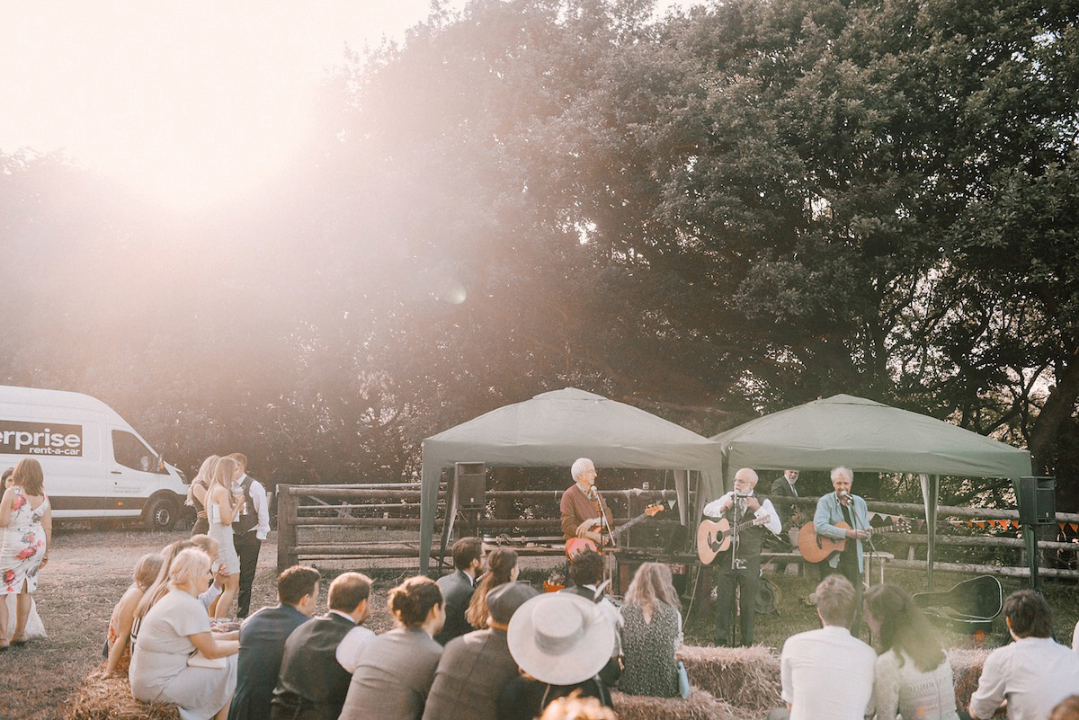 A festival inspired farm wedding in shades of peach. Photography by Rosie Hardy and Adam Bird.