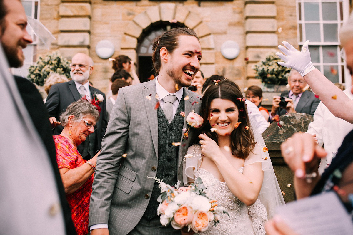 A festival inspired farm wedding in shades of peach. Photography by Rosie Hardy and Adam Bird.