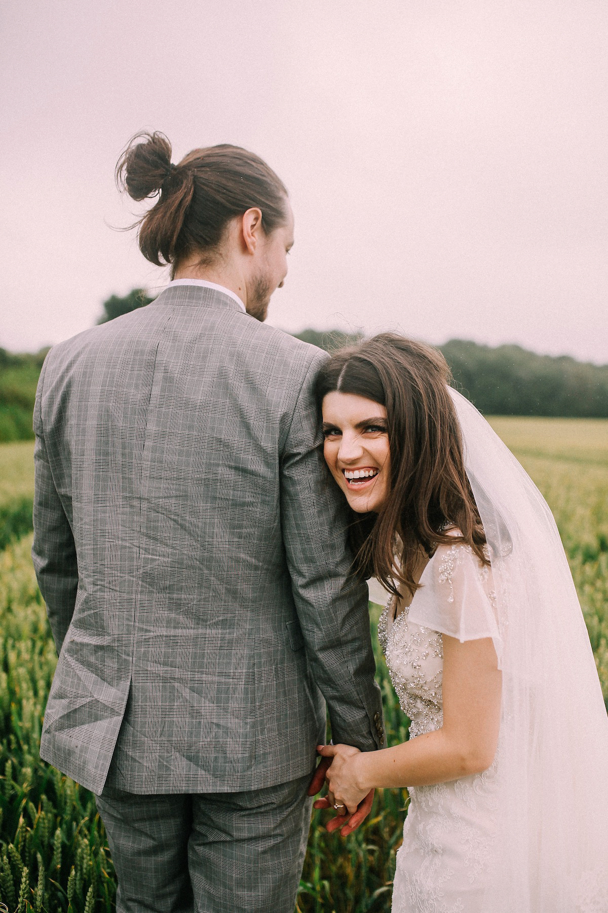 A festival inspired farm wedding in shades of peach. Photography by Rosie Hardy and Adam Bird.