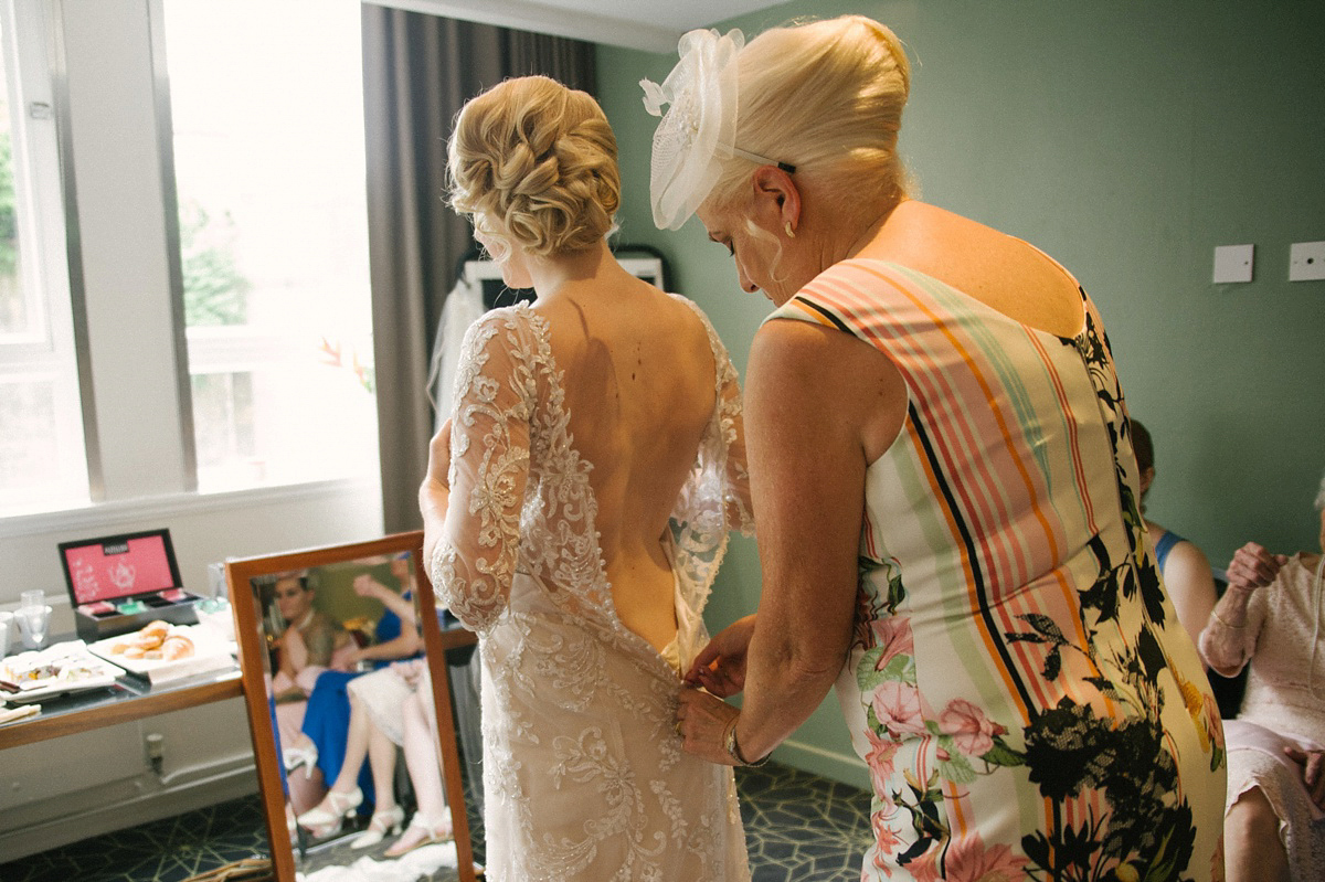 Megan wore Maggie Sottero for her American-English and travel inspired wedding in Scotland. Images captued by ChicPhoto.