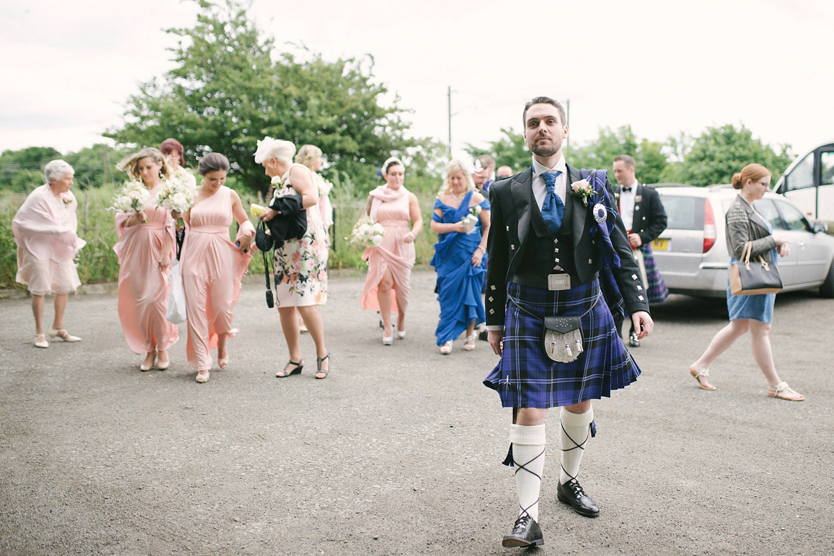 Megan wore Maggie Sottero for her American-English and travel inspired wedding in Scotland. Images captued by ChicPhoto.